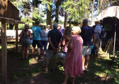 Open day visitors learning about composting
